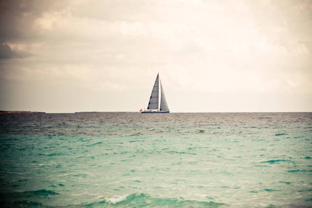 istock Lonely sailboat at the horizon 157678672