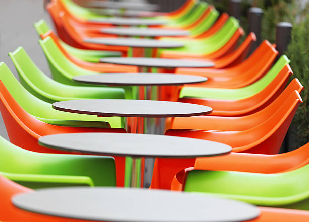 istock colourful chairs and tables in a row 157678813