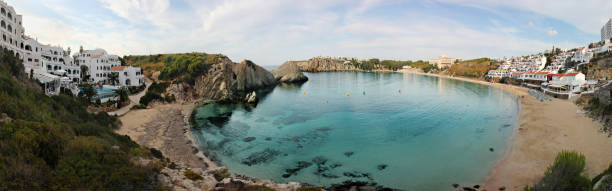 Mediterranean apartment complex on the beachfront of Menorca (Spain). Panorama made from multiple exposures.\n\n[url=file_closeup.php?id=14342862][img]file_thumbview_approve.php?size=1&id=14342862[/img][/url] [url=file_closeup.php?id=14341170][img]file_thumbview_approve.php?size=1&id=14341170[/img][/url] [url=file_closeup.php?id=14337082][img]file_thumbview_approve.php?size=1&id=14337082[/img][/url] [url=file_closeup.php?id=14336748][img]file_thumbview_approve.php?size=1&id=14336748[/img][/url] [url=file_closeup.php?id=14329269][img]file_thumbview_approve.php?size=1&id=14329269[/img][/url] [url=file_closeup.php?id=14329243][img]file_thumbview_approve.php?size=1&id=14329243[/img][/url] [url=file_closeup.php?id=14328852][img]file_thumbview_approve.php?size=1&id=14328852[/img][/url]\n\n\n[url=http://www.istockphoto.com/my_lightbox_contents.php?lightboxID=9343923][img]http://www.joanvicentcanto.com/directori/menorca.jpg[/img][/url] \n[url=http://www.istockphoto.com/my_lightbox_contents.php?lightboxID=6651609][img]http://www.joanvicentcanto.com/directori/vetta.jpg[/img][/url] \n[url=http://www.istockphoto.com/my_lightbox_contents.php?lightboxID=659414][img]http://dl.dropbox.com/u/17131122/LIGHTBOXES/landscapes.jpg[/img][/url] \n \n[url=http://www.istockphoto.com/my_lightbox_contents.php?lightboxID=736829][img]http://www.joanvicentcanto.com/directori/urban.jpg[/img][/url]