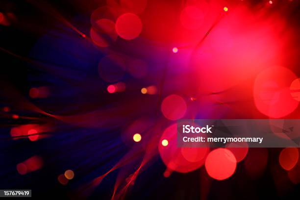 Blurred View Of Red Lights Small And Large Stock Photo - Download Image Now - Red, Technology, Abstract
