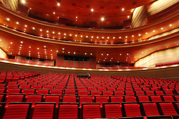 Red Theater Seats Red Theater Seats concert hall photos stock pictures, royalty-free photos & images