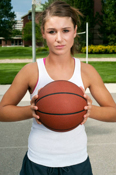 istock Young Female Athlete with Basketball 157679501
