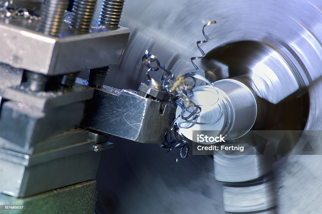 Токарный станок в операции обработки нержавеющей стали - Стоковые фото Machinery роялти-фри
