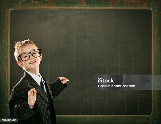 Young Clever Science Student Explain With Copyspace Blackboard Stock Photo - Download Image Now