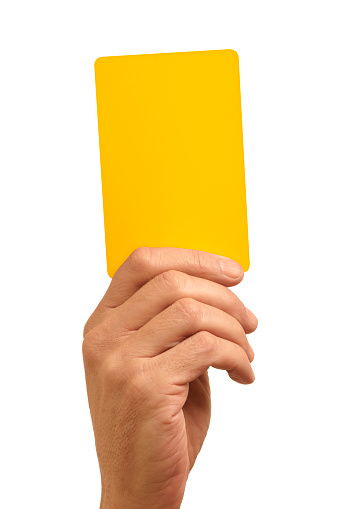 Hand holding a Yellow card,with clipping path