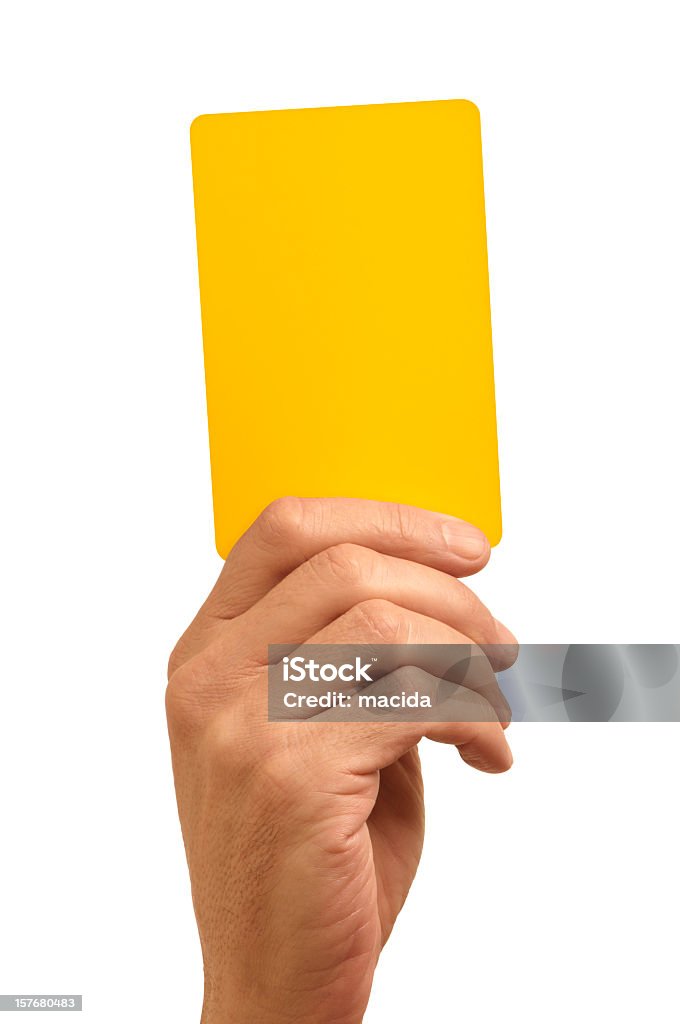 Hand holding bright yellow card against white background Hand holding a Yellow card,with clipping path Yellow Card - Sport Symbol Stock Photo