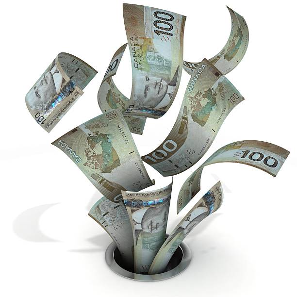 money down the drain-kanadische dollar - money down the drain stock-fotos und bilder