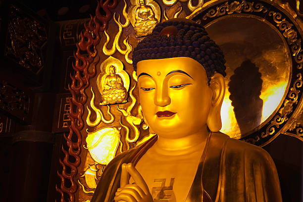 gold Gautama Buddha statue  shingon buddhism stock pictures, royalty-free photos & images