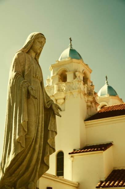 istock Catholic Church and Virgin Mary Statue 157680646