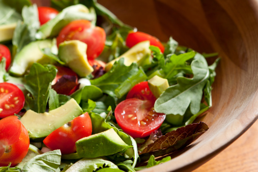 Fresh salad with cherry tomatoes, avocado and mixed greens