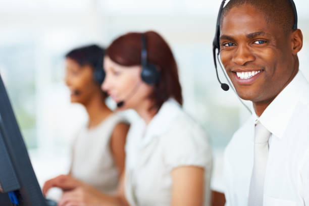 istock Happy business man with his team working in call centre 157680772