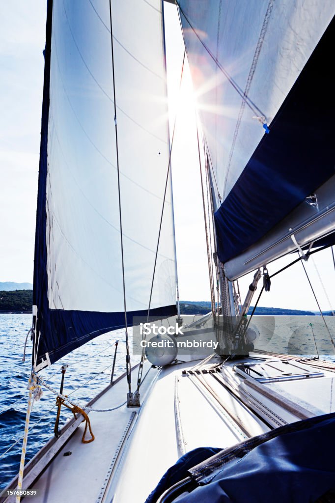 Sailing at sunset Sailing in the wind.  Activity Stock Photo