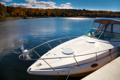 Luxury Boat Moored in Sunny Autumn Harbor