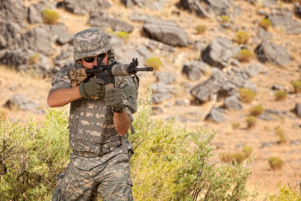 istock Special ops military soldier shooting an assault rifle 157681259