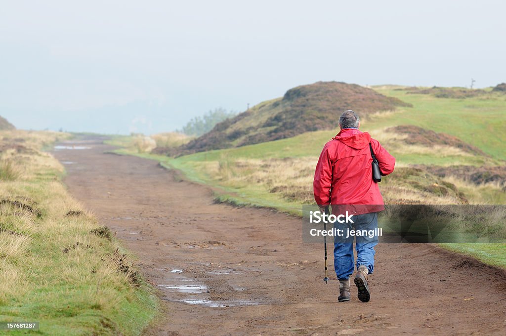 active senior hiking on the moors  60-69 Years Stock Photo