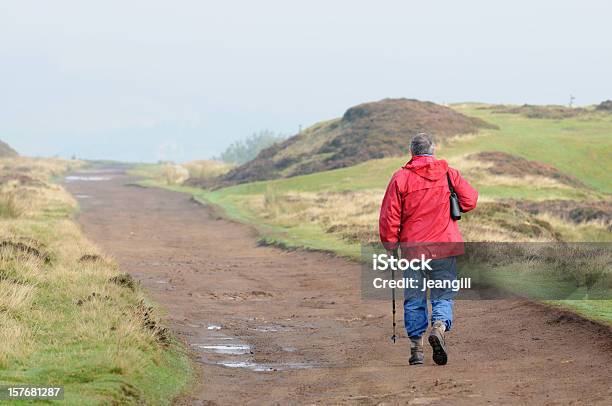 Active Senior Hiking On The Moors Stock Photo - Download Image Now - 60-69 Years, 65-69 Years, Active Lifestyle