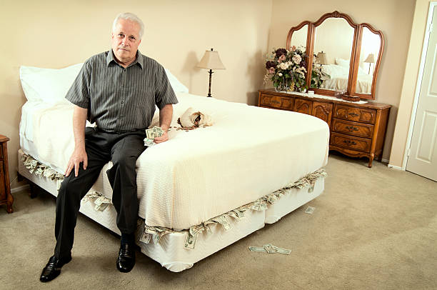 Money under Mattress stock photo