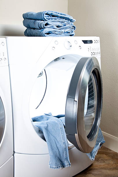 Piping parkere flygtninge Stack Denim Jeans Energy Efficient Front Load Dryer Drying Laundry Stock  Photo - Download Image Now - iStock
