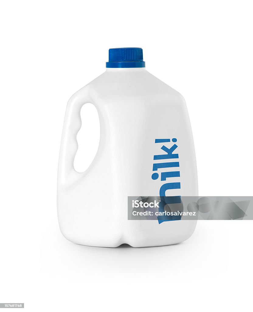A white bottle of milk with blue lid Milk bottle isolated with clipping path. Gallon Stock Photo