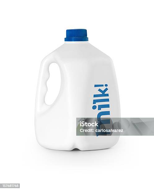 A White Bottle Of Milk With Blue Lid Stock Photo - Download Image Now - Gallon, Milk, Bottle