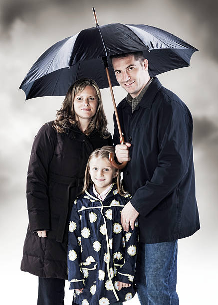 istock Family under an Umbrella 157681799