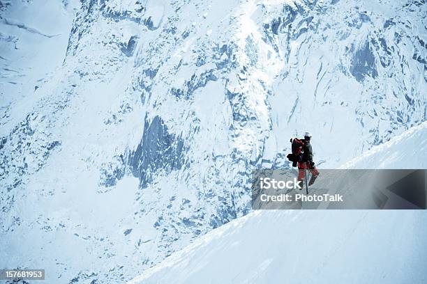 Male Adventurer Walking On Snow Mountain Xlarge Stock Photo - Download Image Now - Snow, Mountain, Skiing