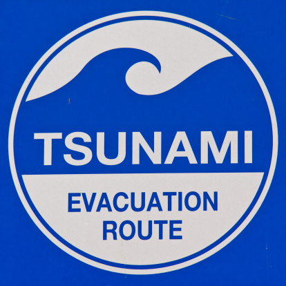 Tsunami warning sign at the beach in Phuket, Thailand