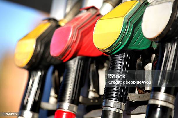 Fuel Pump Nozzles Close Up In A Service Station Stock Photo - Download Image Now - Fossil Fuel, Natural Gas, Station