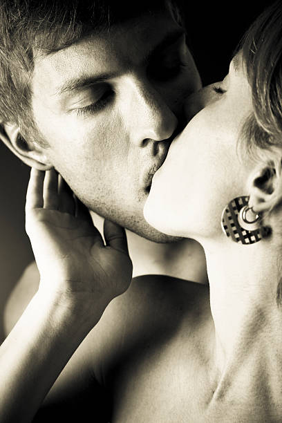 istock Young couple kissing 157682025