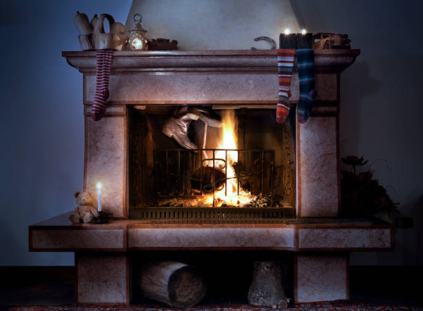 Fire in a  brick fireplace in winter. Front view.