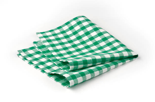 istock Green and white checked napkin roughly folded 157682185