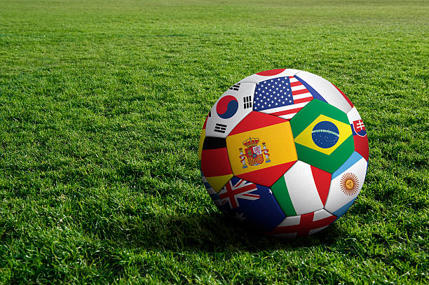 Soccer ball Soccer ball with national flags.  international soccer event photos stock pictures, royalty-free photos & images