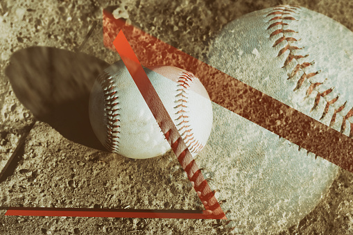 Fractured concept of baseball in multiple exposure from field dirt, sports graphic concept.