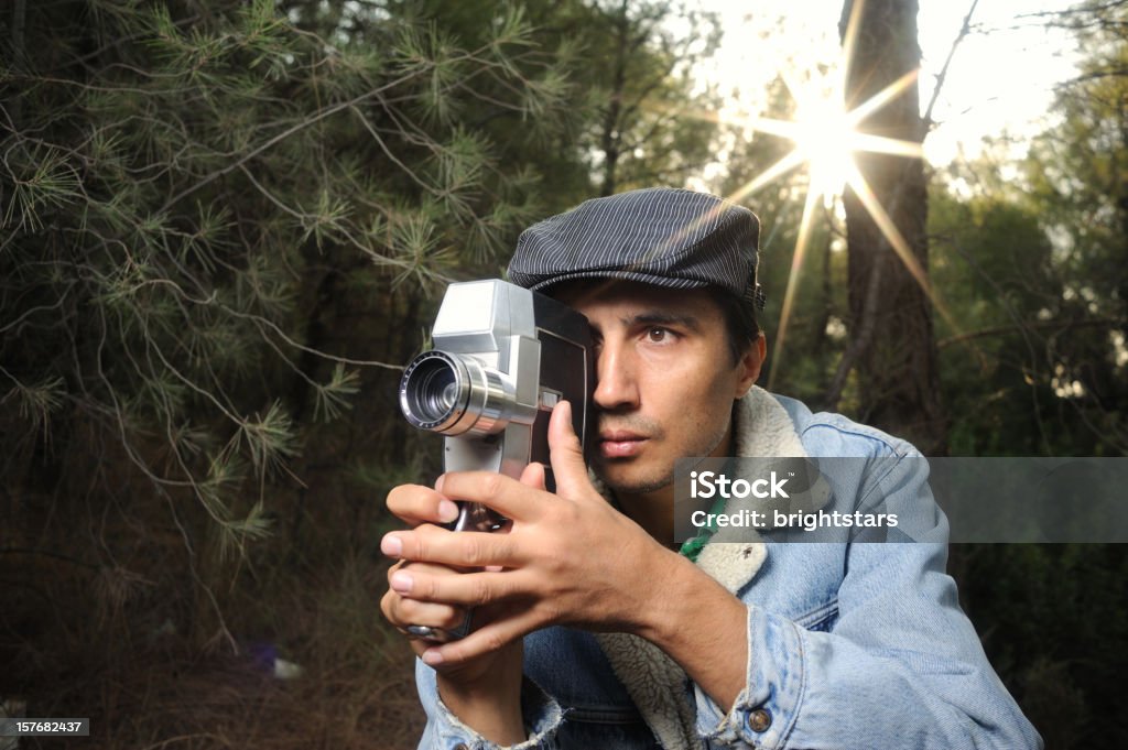 Homem a filmar com a Câmera de filme de 16 mm - Royalty-free Adulto Foto de stock