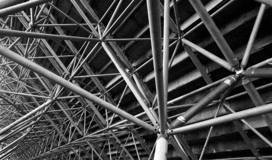 A large, temporary stadium, seen from below. Film grain visible (scan from Delta 3200)