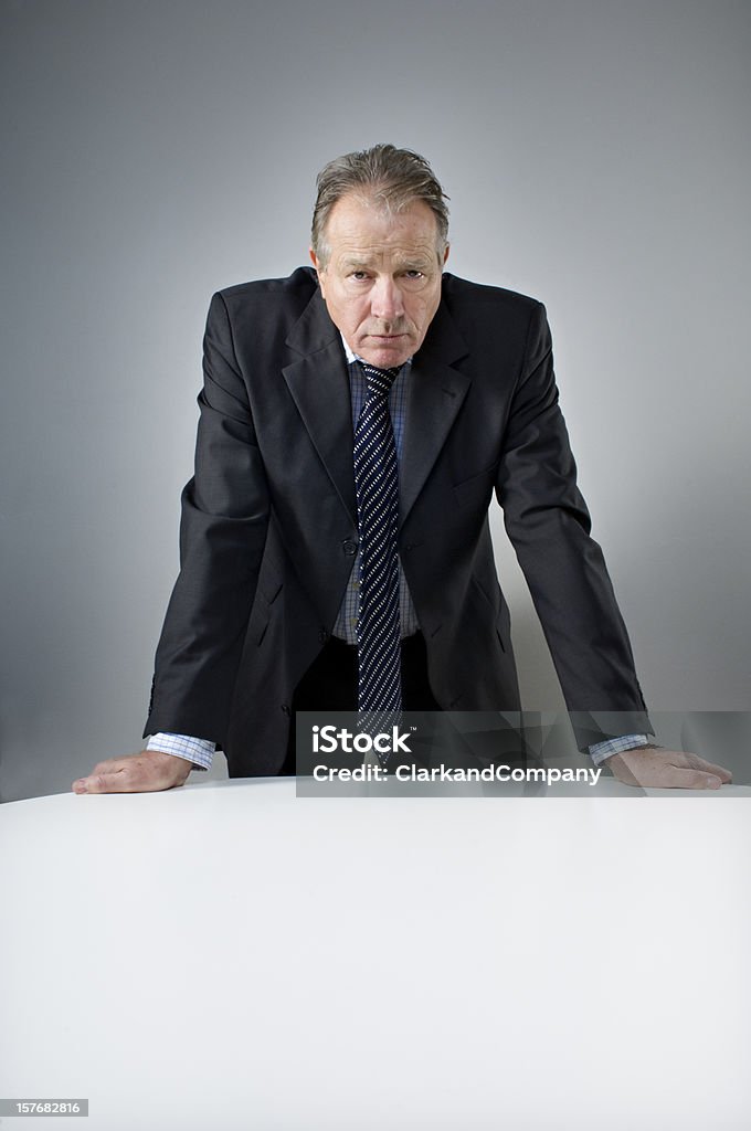 Stern Looking Bank Manager Portrait  Interrogation Stock Photo