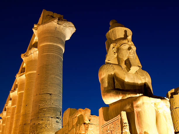 Temple of Luxor, Egypt Pharaoh at the Temple of Luxor, Egypt at night rameses ii stock pictures, royalty-free photos & images