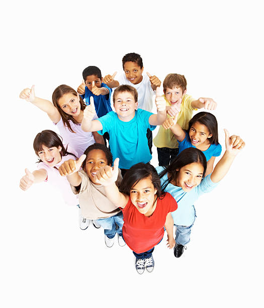 top view of happy multi расовой детей жестикулировать жест класс - thumbs up teenager adolescence group of people стоковые фото и изображения