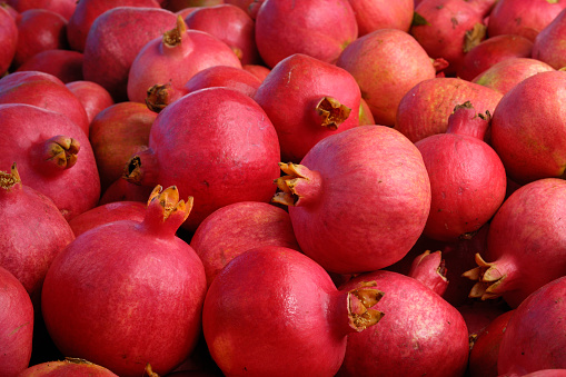 fresh pomegranate at fruit store for sale at evening