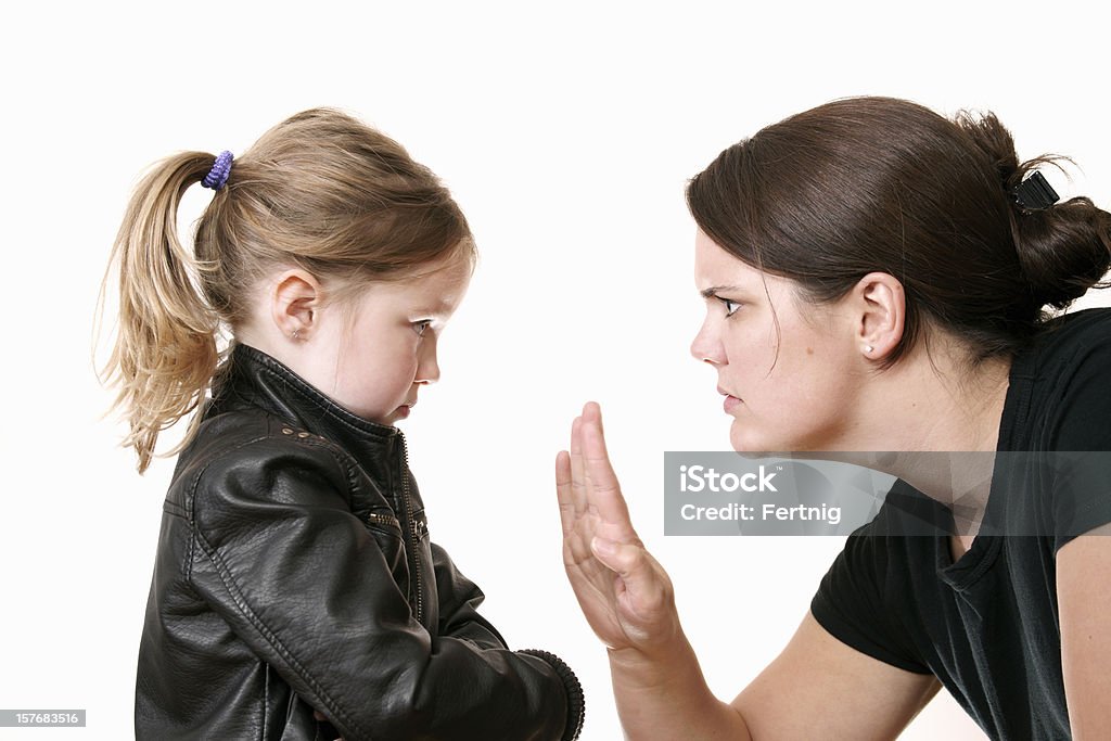 Mãe discipling seu filho - Foto de stock de Criança royalty-free