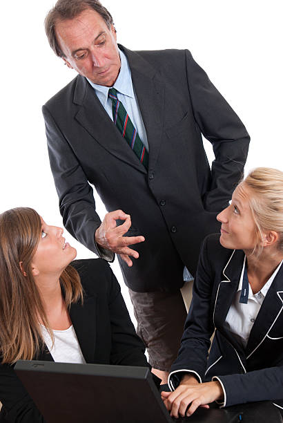 istock Teacher Man control his student to make homework - School 157683693