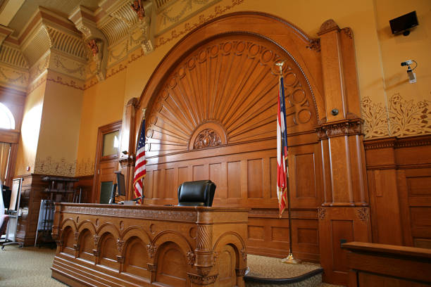 istock Inside of a courtroom with American flags 157683809