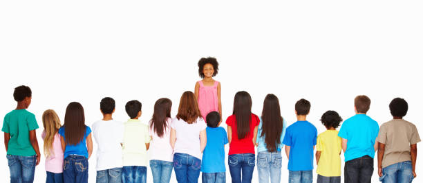 istock Rear view of multi ethnic kids standing in line 157684128