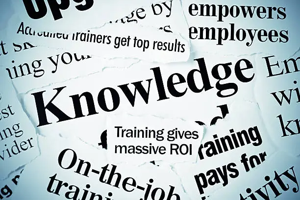 Photo of Newspaper headlines focused on knowledge and training for employees