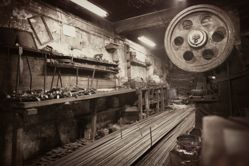 Old equipment, machines, tools in a rustic style in an abandoned mechanical factory