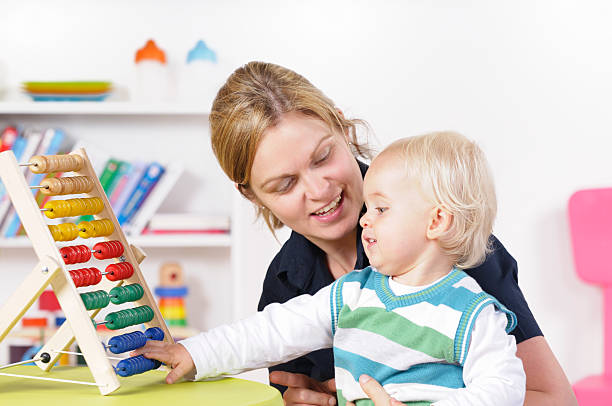 istock Caucasian Baby Boy/ Toddler Playing While Being Surpervised 157684631