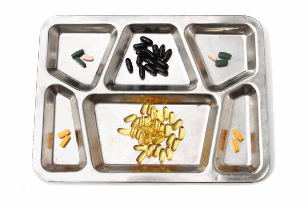 Various white blister packs of pills - white background