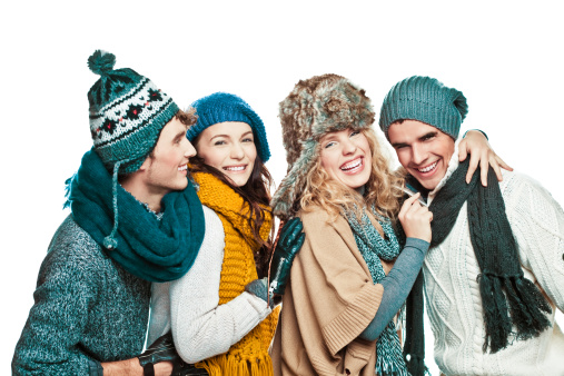 Young adults in winter clothes