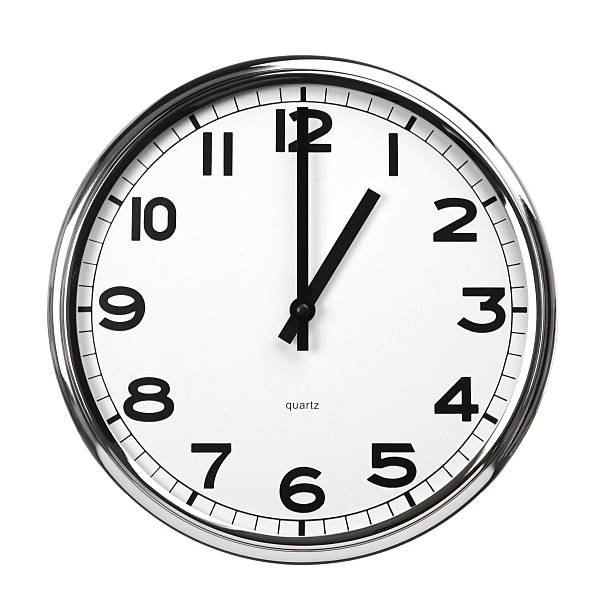 istock Wall clock with metal surround, hands read 1 o-clock 157684867