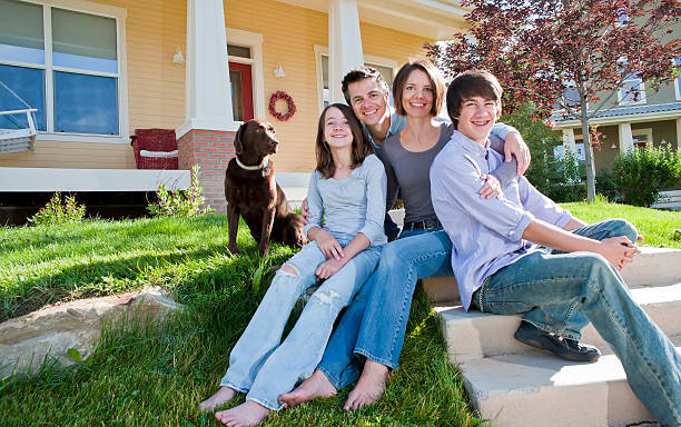 istock Happy american family with dog 157685611